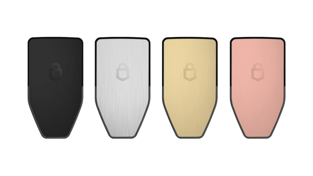 Image of the Trezor Safe 3 in various colors including, Black, Silver, Gold, and Rose.